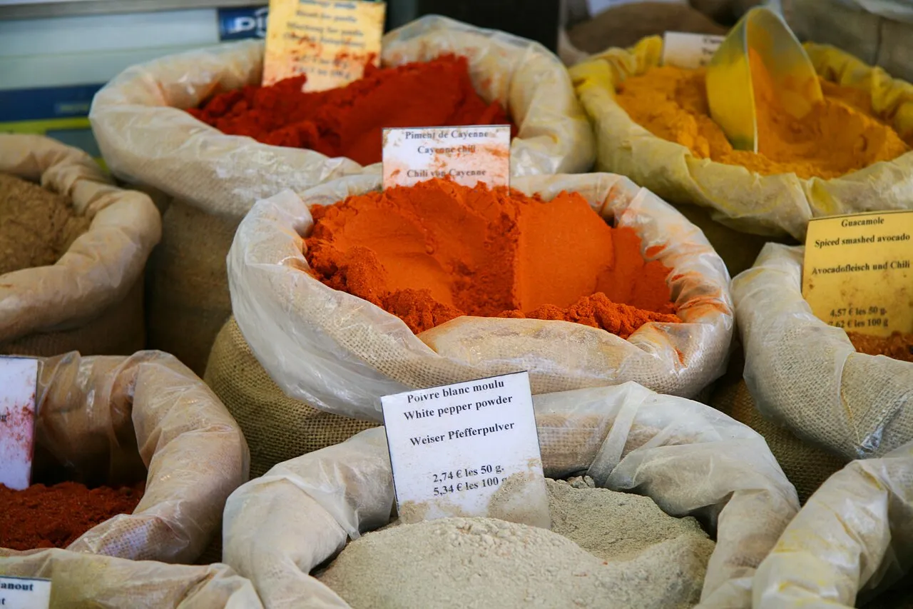 Colorful spices and market produce at the Saturday market in Apt