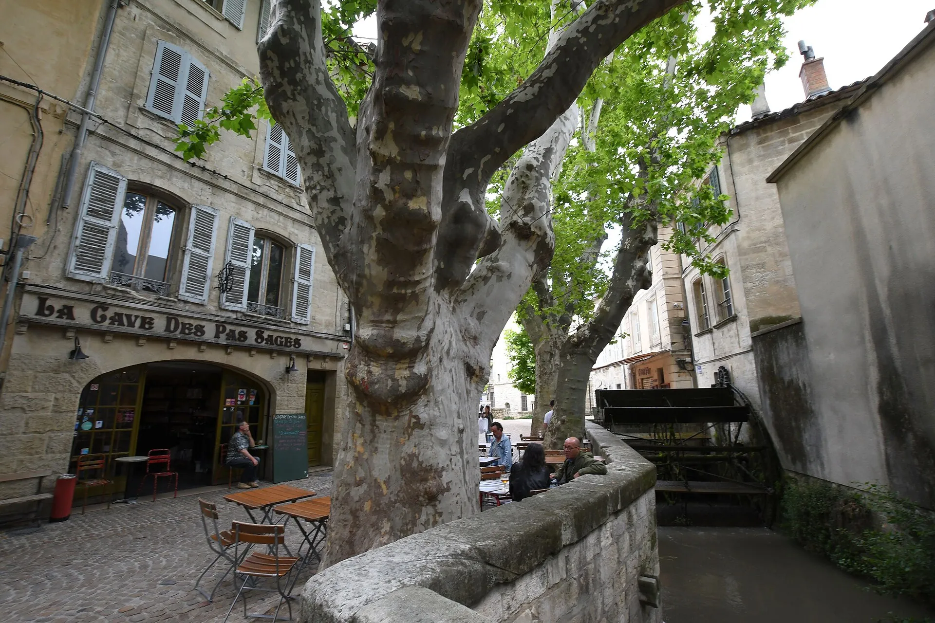 Colourful facade of a bistro on an Avignon street